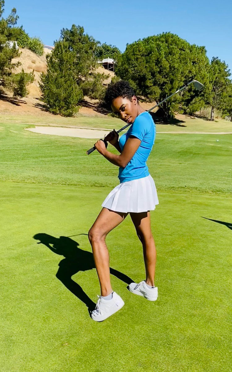 Carrie Bernans in golf outfit