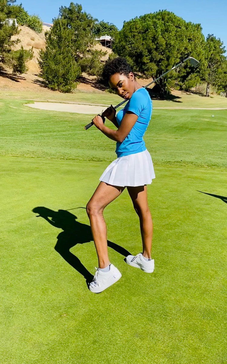 Carrie Bernans in golf outfit